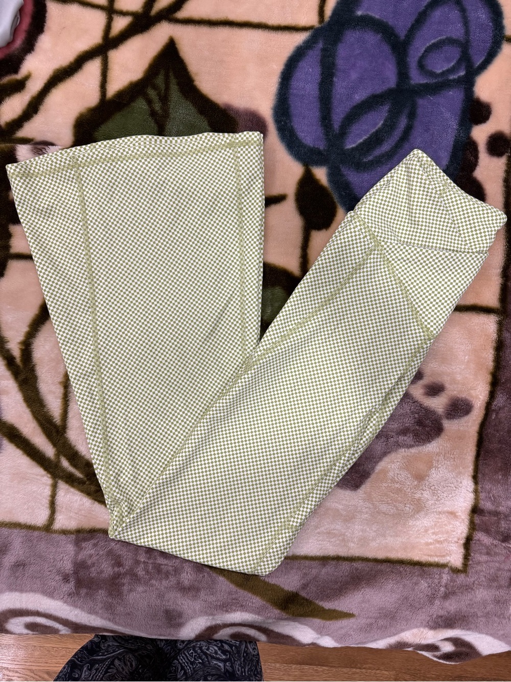 Green and white Fabletics checkered flare leggings